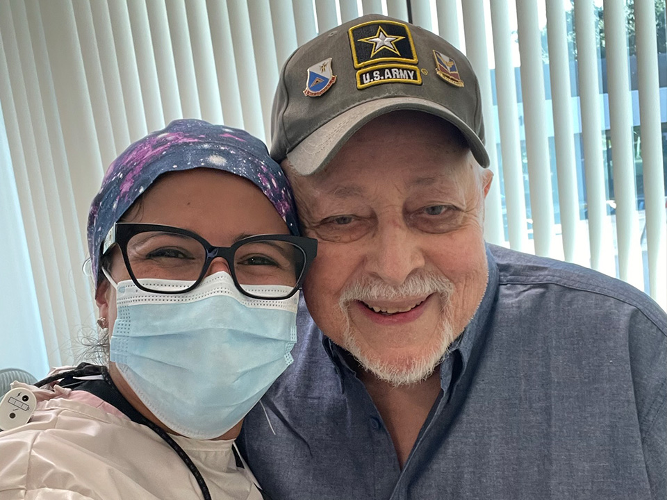Dr. Lozano with a patient
