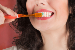 Woman Brushing Teeth 